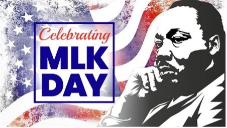 Celebrating MLK Day. Martin Luther King looks just off camera with his head resting against his hand.