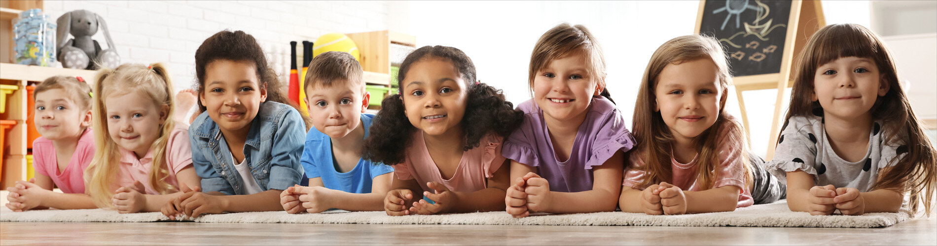 A group of kids in a classroom.