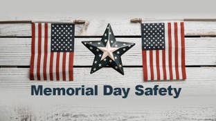 Memorial Day Safety. Two American flags with a metal star between them